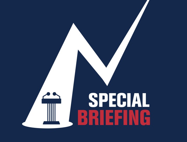 Title special briefing with a podium under a spotlight